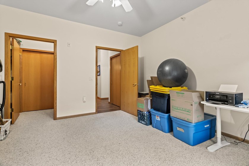 Welcome home to this bright and airy 55+ condominium in the - photo 20