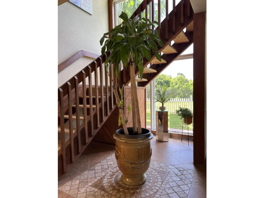 Is there a 4-bedroom home in Palm Beach County with acreage - photo 21