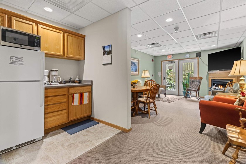 Welcome home to this bright and airy 55+ condominium in the - photo 24