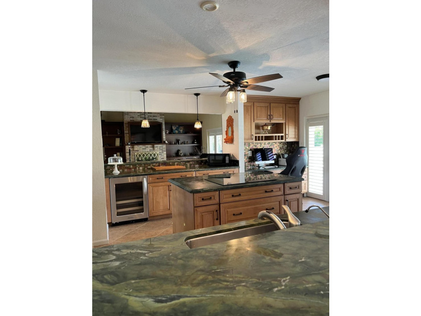 Is there a 4-bedroom home in Palm Beach County with acreage - photo 27