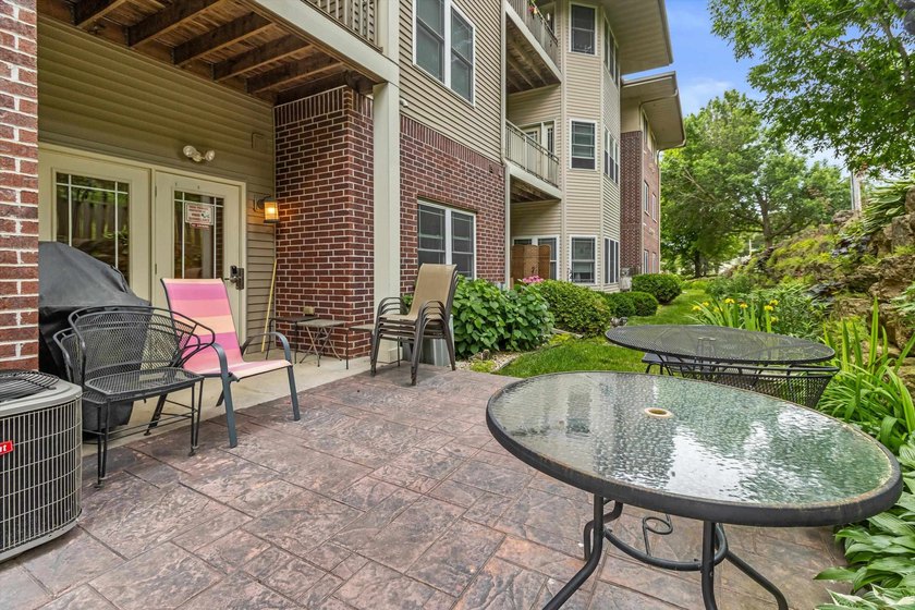 Welcome home to this bright and airy 55+ condominium in the - photo 30