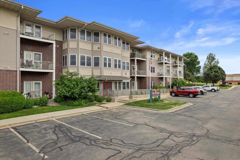 Welcome home to this bright and airy 55+ condominium in the - photo 33
