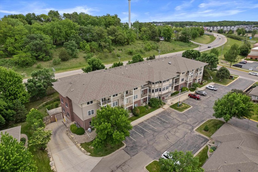 Welcome home to this bright and airy 55+ condominium in the - photo 34