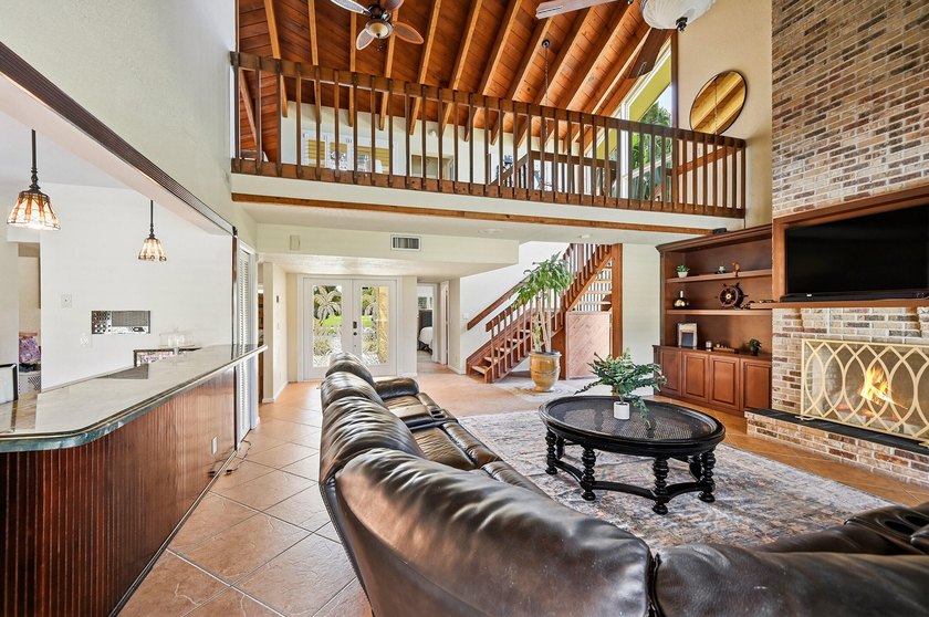 Is there a 4-bedroom home in Palm Beach County with acreage - photo 36