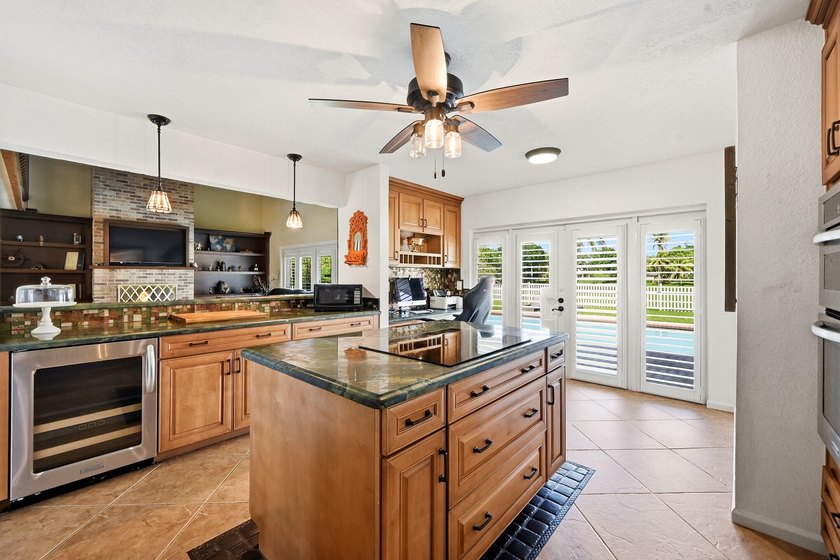 Is there a 4-bedroom home in Palm Beach County with acreage - photo 43