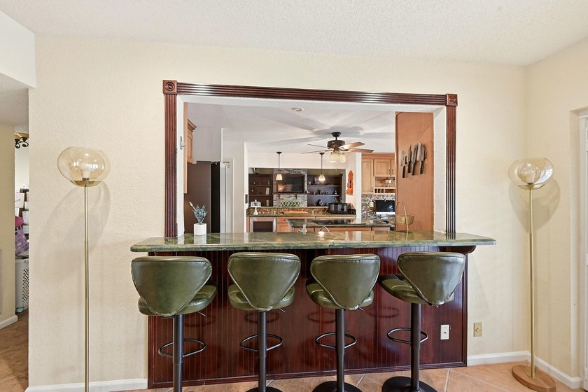 Is there a 4-bedroom home in Palm Beach County with acreage - photo 44