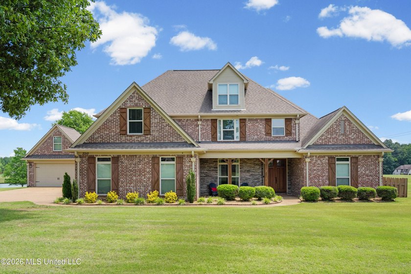 Situated on just over 1.5 acres backing up to the neighborhood - photo 2