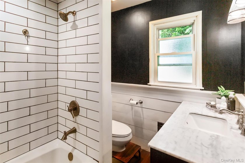 Welcome to 2877 Calvin, a classic cape style residence nestled - photo 16