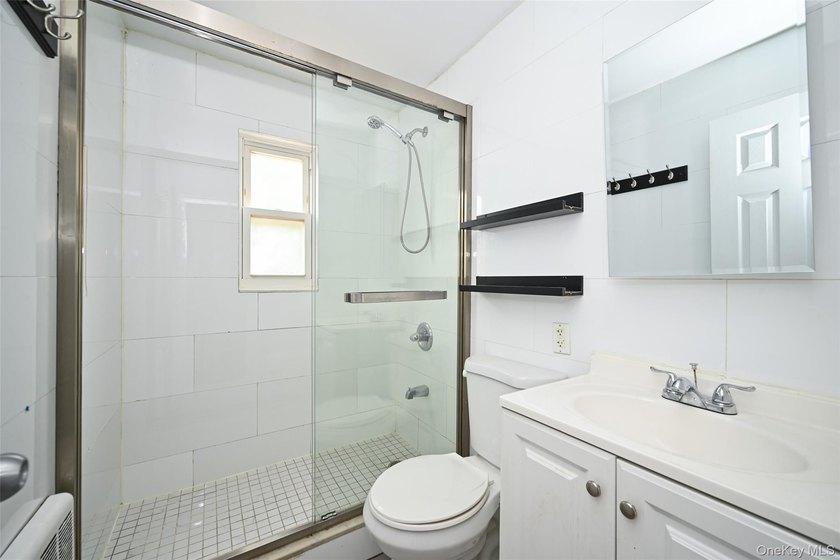 This charming home features 3 bedrooms and 2 full bathrooms - photo 12