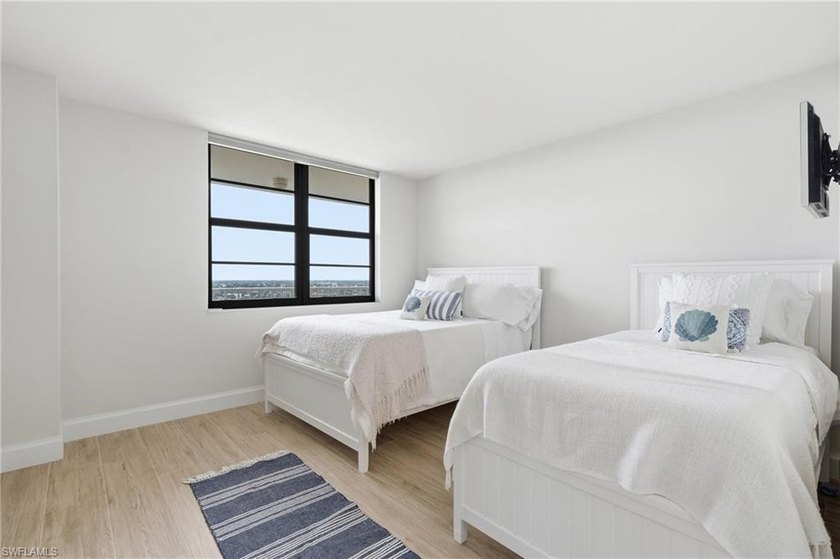 Rarely available, highly sought after 15th-floor corner end unit - photo 22