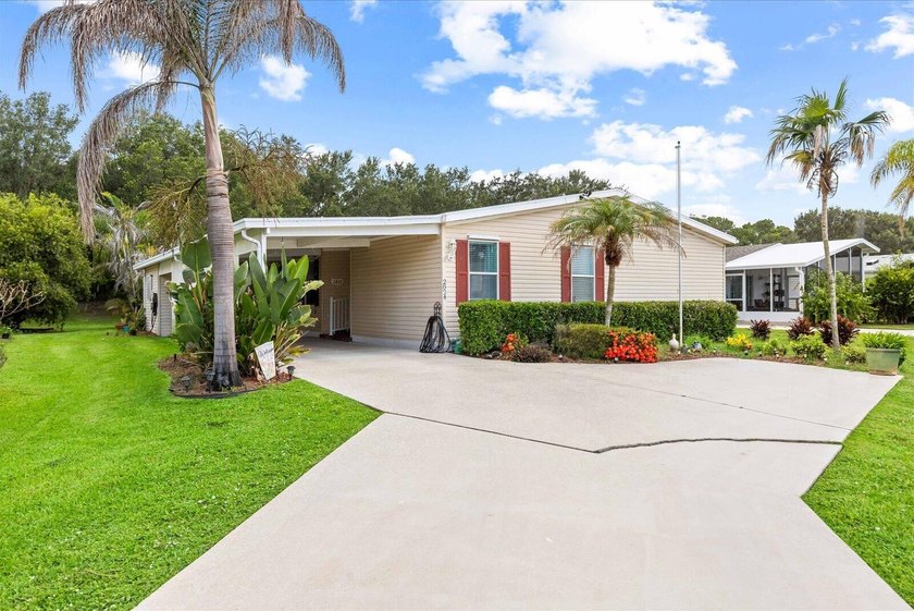 Welcome to your Florida retirement dream! Nestled on a quiet - photo 2
