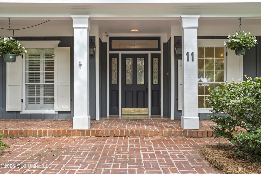 A canopy of magnificent century-old live oaks welcomes you to - photo 11