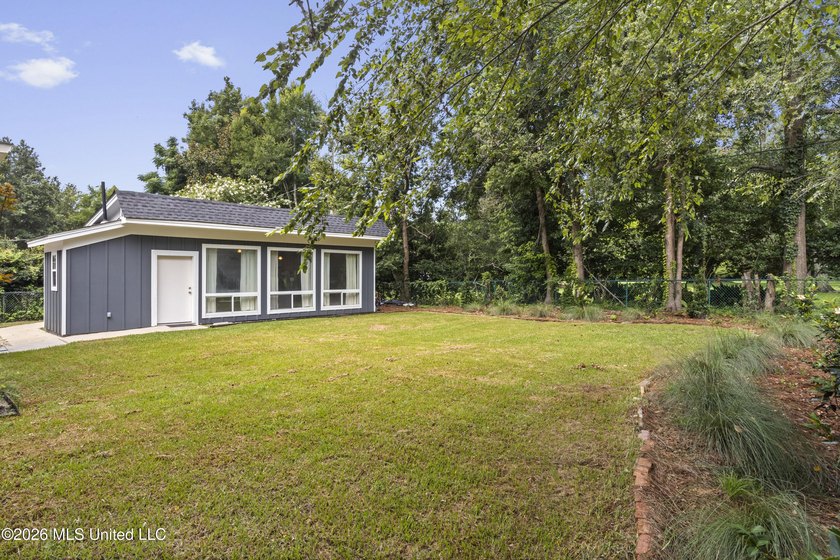 A canopy of magnificent century-old live oaks welcomes you to - photo 49