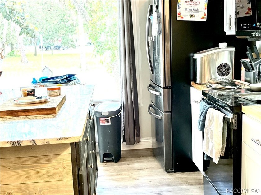 Check out this great double wide mobile on a 1.05 acre lot. It - photo 9