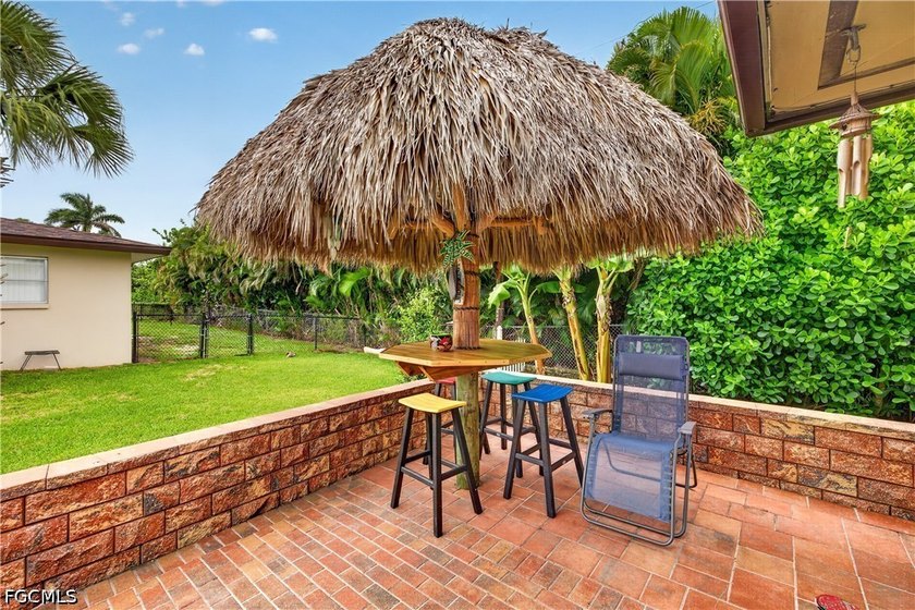 Adorable home ideally located just three lots from the river and - photo 13