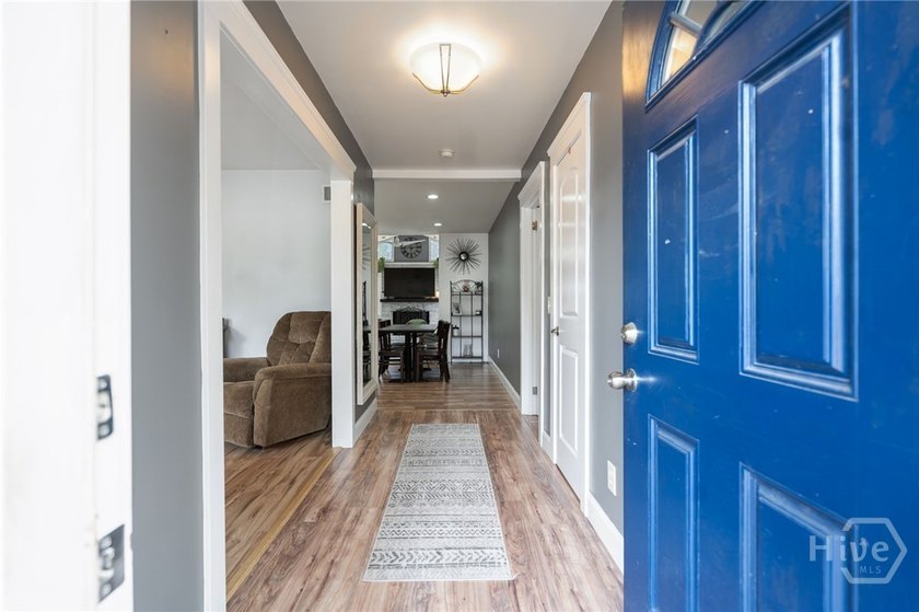 Welcome to this charming 3 bedroom, 1.5 bath home nestled in the - photo 3