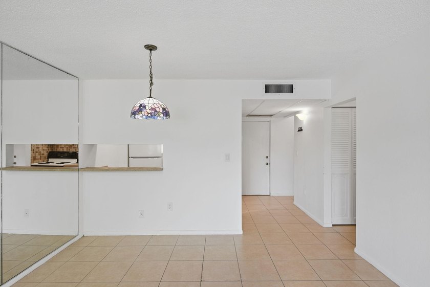 Freshly painted and exceptionally maintained, this bright and - photo 8
