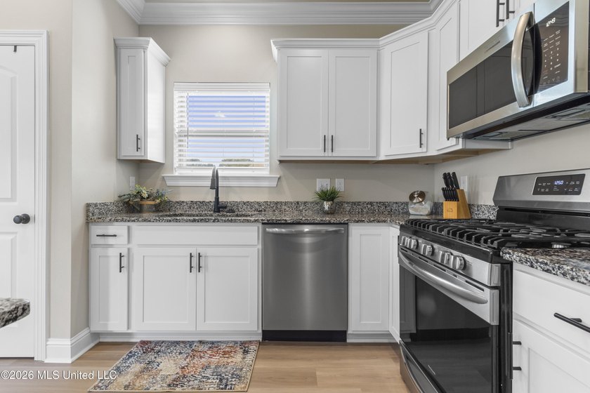 ADORABLE brick home on a large corner lot in Rosalie Place! The - photo 17