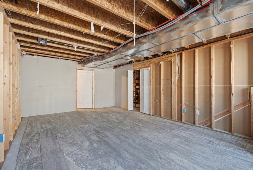 2 STORY UPGRADED IVORY BUILT GEM- Dreamy Great room/kitchen - photo 39
