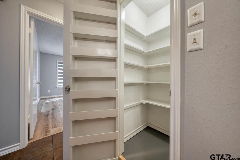 Nestled on a quiet street, this inviting residence blends - photo 18