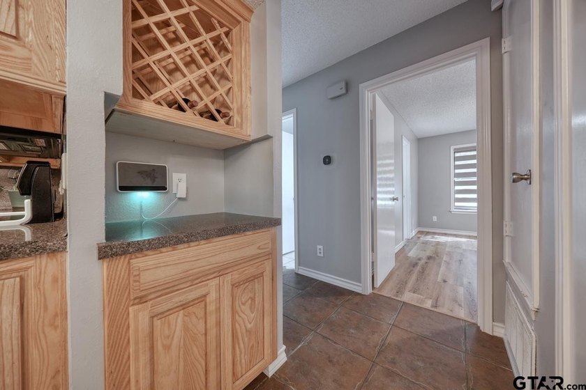 Nestled on a quiet street, this inviting residence blends - photo 19