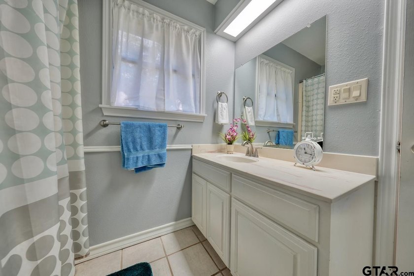 Nestled on a quiet street, this inviting residence blends - photo 25