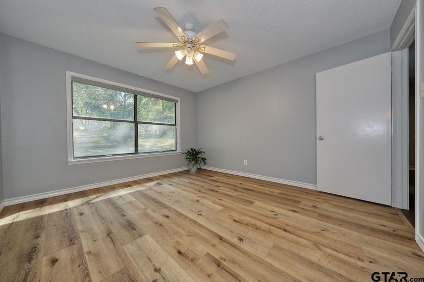 Nestled on a quiet street, this inviting residence blends - photo 28