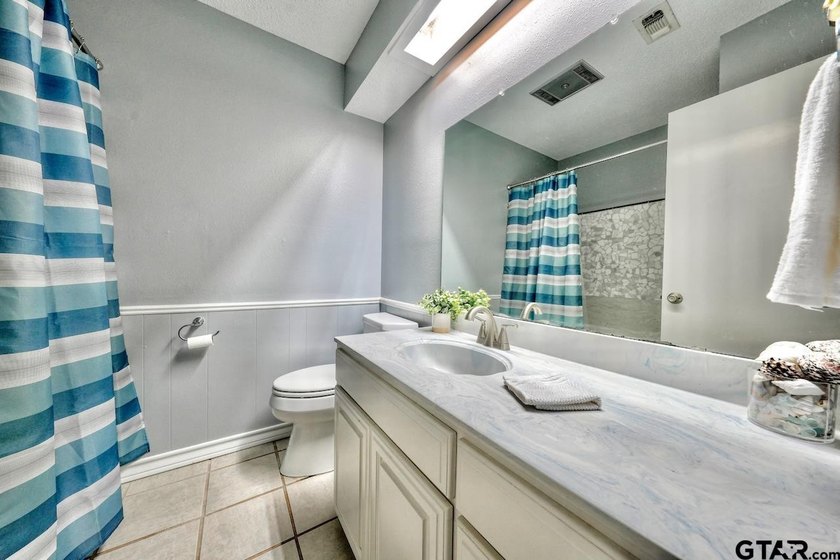 Nestled on a quiet street, this inviting residence blends - photo 30