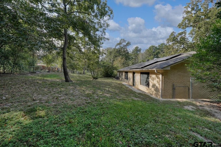 Nestled on a quiet street, this inviting residence blends - photo 33