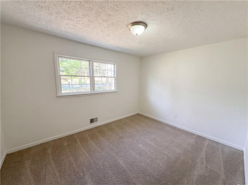 Welcome to 2006 Chelsea Ln, a home that exudes warmth and - photo 14