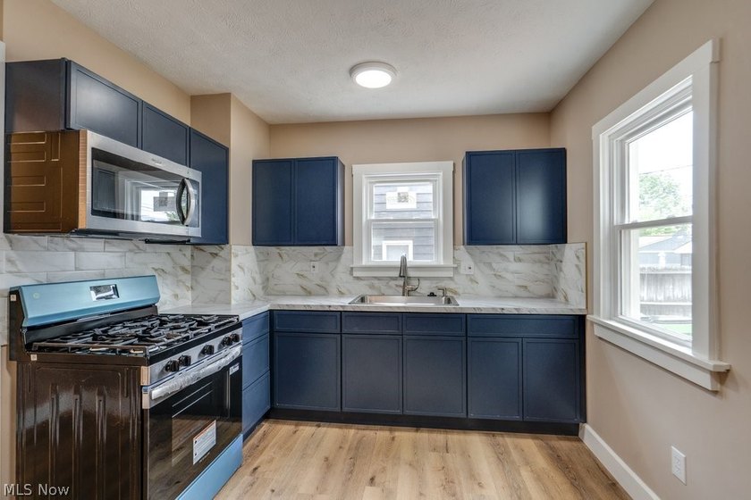 Move-in ready with extensive updates! New windows, flooring - photo 11