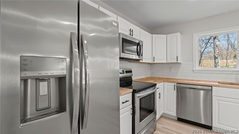 Lake view home with modern updates! This newly remodeled home - photo 28