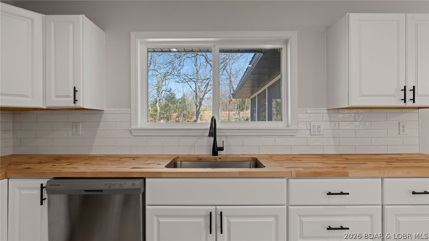 Lake view home with modern updates! This newly remodeled home - photo 30