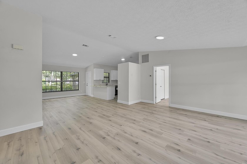 Welcome home to this beautifully remodeled residence nestled in - photo 6