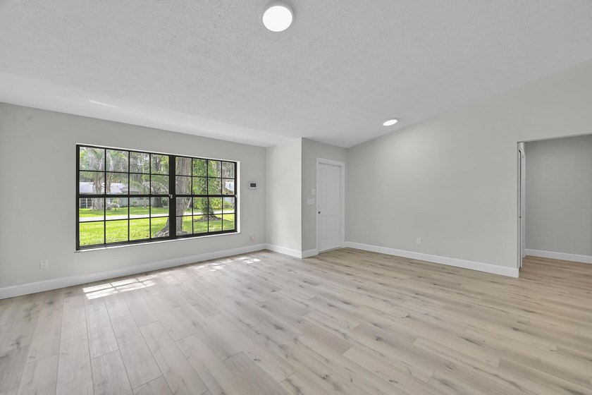 Welcome home to this beautifully remodeled residence nestled in - photo 8