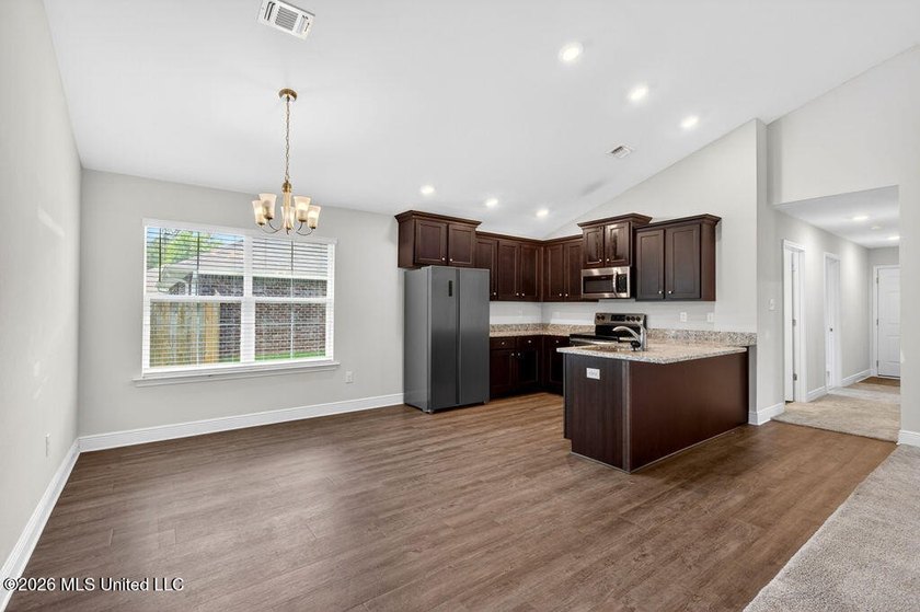 This is the home you've been waiting for! VA Assumable loan with - photo 9