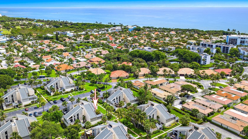 Just a 5-minute walk to Jupiter Beach, this 2-bedroom, 2 bath - photo 2