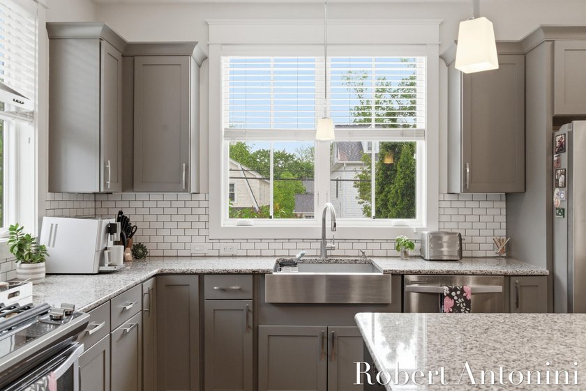 Now is your opportunity to own one of East Grand Rapids' most - photo 22