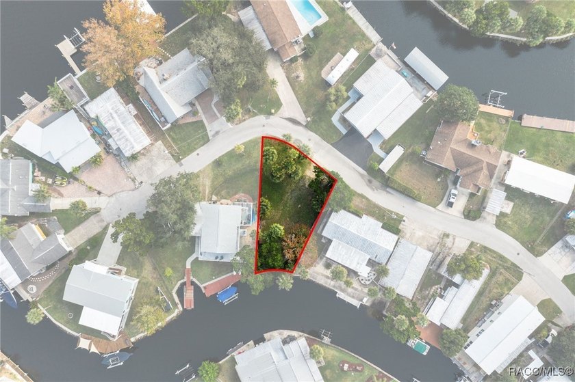 Discover a rare opportunity to own cleared waterfront land on a - photo 2