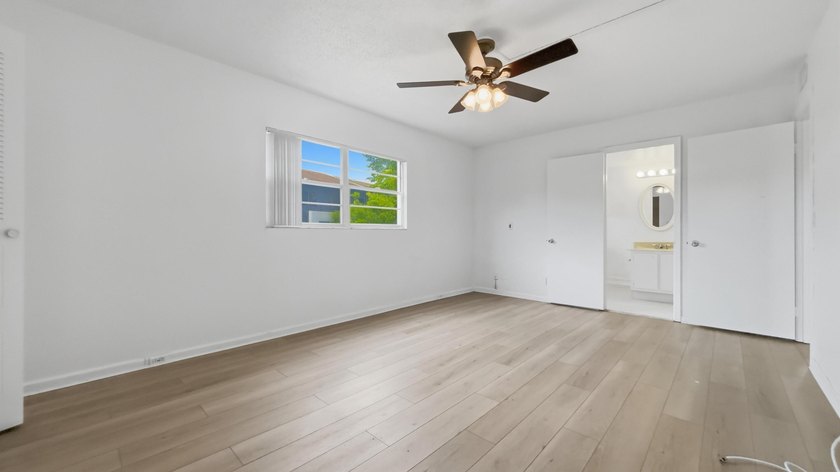 Beautiful corner unit featuring 2 bedrooms and 2 bathrooms with - photo 9