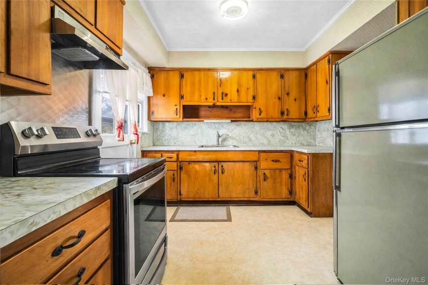 Welcome to 1097 Carll Drive, nestled in the highly desirable and - photo 13