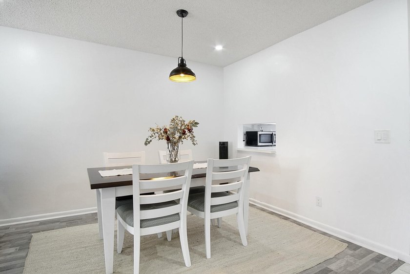 Beautifully updated 2-bedroom, 2-bath second-floor condo located - photo 6