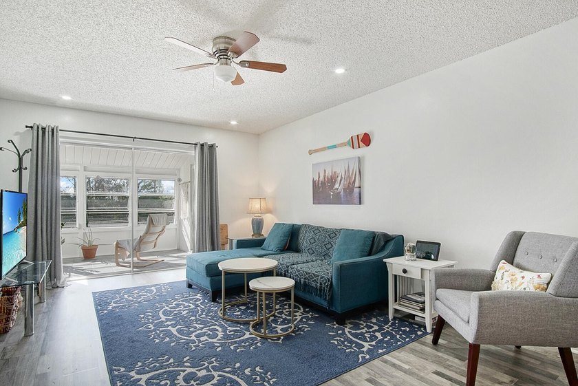 Beautifully updated 2-bedroom, 2-bath second-floor condo located - photo 7