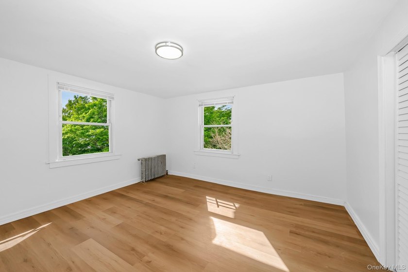 Beautifully renovated legal two-family home offering updates - photo 13