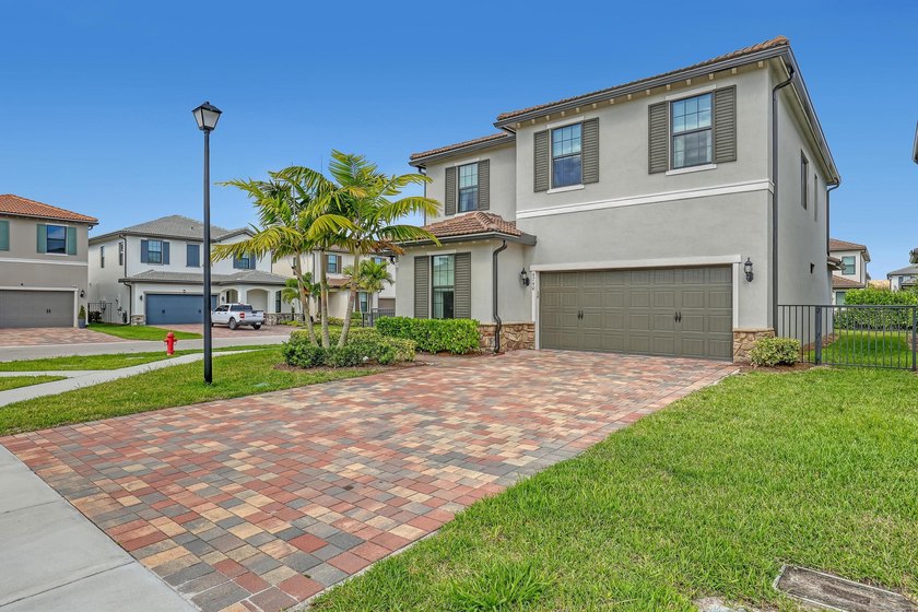 Stunning 2023-built 5-bedroom retreat in the gated community of - photo 2