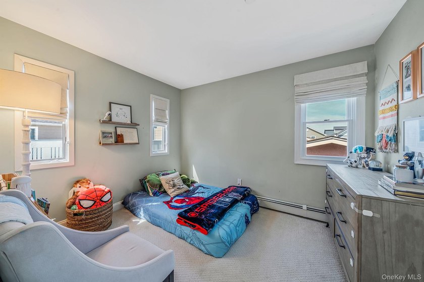 Just over one block from the beach, this fully renovated home - photo 19