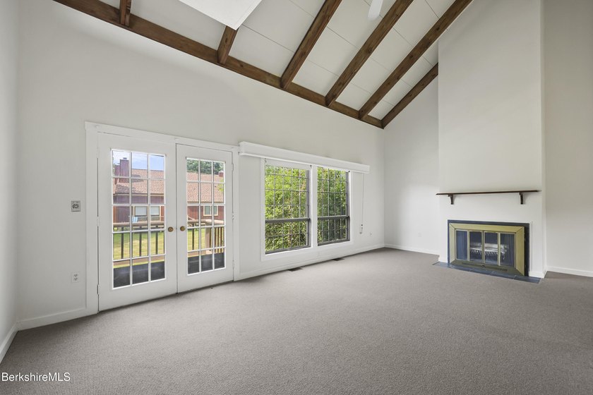 Enjoy easy Berkshire living in this spacious end-unit condo at - photo 3
