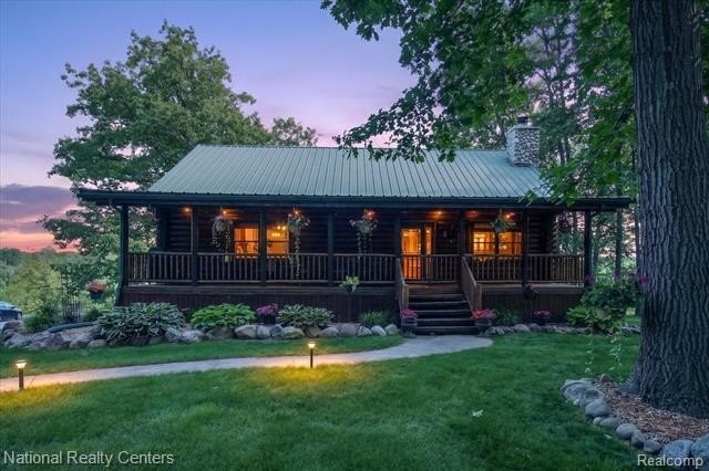 Welcome to this meticulously maintained 2,400 sq. ft. log home - photo 4