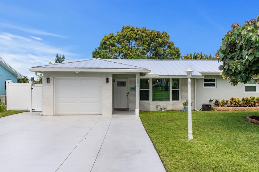 Completely transformed and move-in ready with NO HOA! This - photo 2