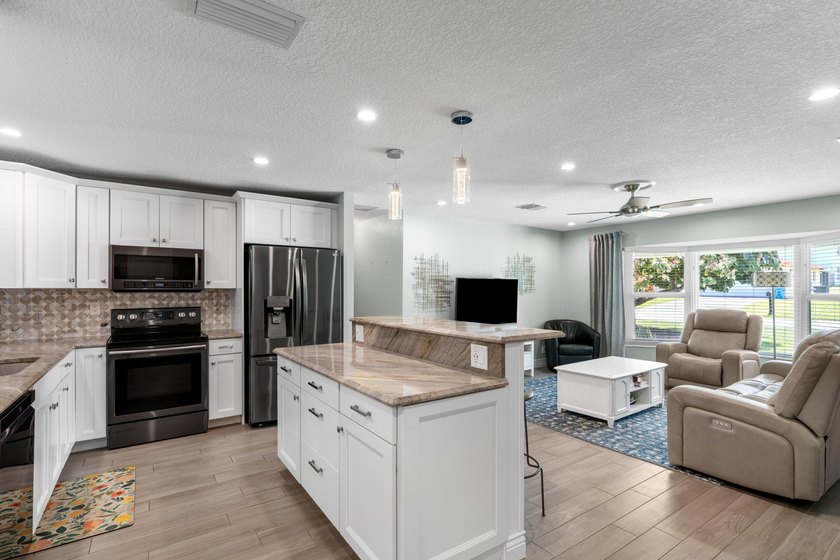 Completely transformed and move-in ready with NO HOA! This - photo 5